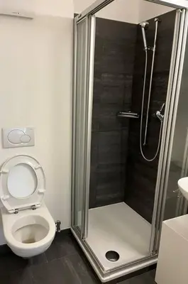 Ein Badezimmer in der Unterkunft Perla Garden, stylish apartment