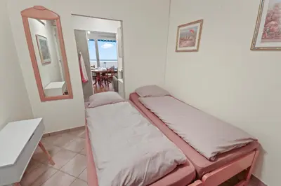 Ein Bett oder Betten in einem Zimmer der Unterkunft Logement avec vue époustouflante sur les montagnes