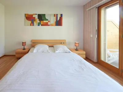 Ein Bett oder Betten in einem Zimmer der Unterkunft Apartment Sérandes-4 by Interhome