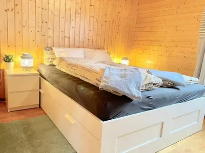 Ein Bett oder Betten in einem Zimmer der Unterkunft stunning panoramic views! Hottube & Sauna