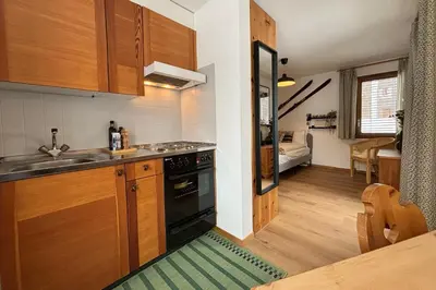 Küche/Küchenzeile in der Unterkunft Charming studio, Bettmerhorn view