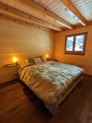 Ein Bett oder Betten in einem Zimmer der Unterkunft Chalet Adler