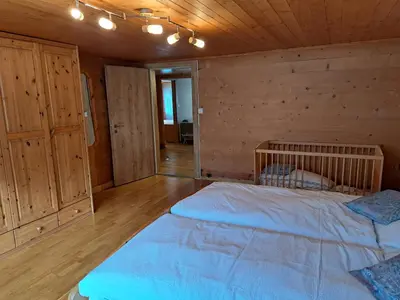 Ein Bett oder Betten in einem Zimmer der Unterkunft Alpengruss
