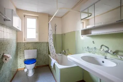 Ein Badezimmer in der Unterkunft Chalet Seehus Iseltwald