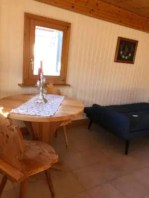 Ein Sitzbereich in der Unterkunft Chalet Crans-Montana