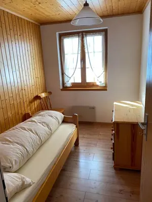 Ein Bett oder Betten in einem Zimmer der Unterkunft Chalet Bellwald