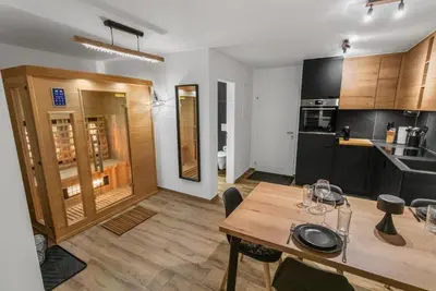Küche/Küchenzeile in der Unterkunft Appartement rénové avec vue panoramique et sauna
