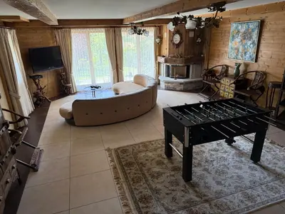 Ein Sitzbereich in der Unterkunft Grand chalet au centre
