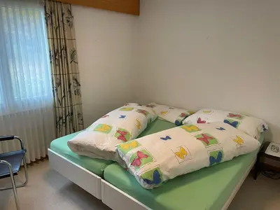Ein Bett oder Betten in einem Zimmer der Unterkunft Apartment Ferienwohnung Waldrand EG by Interhome
