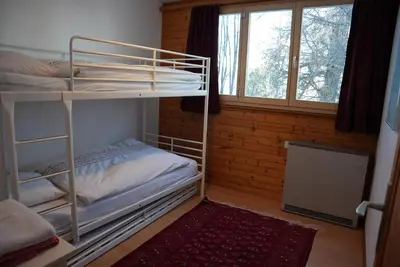 Ein Bett oder Betten in einem Zimmer der Unterkunft Chalet Rossier Mayens de Sion aux 4 Vallées