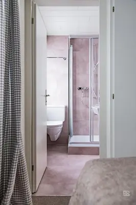 Ein Bett oder Betten in einem Zimmer der Unterkunft Hotel Bergidyll - Riders Haven