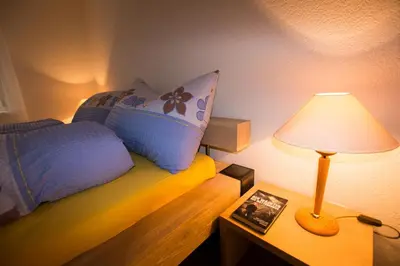 Ein Bett oder Betten in einem Zimmer der Unterkunft Residence Bellevue