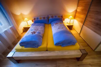 Ein Bett oder Betten in einem Zimmer der Unterkunft Residence Bellevue