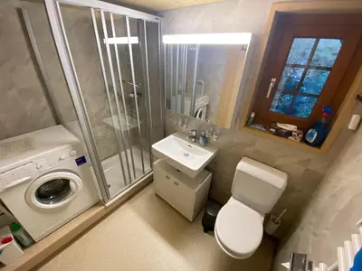 Ein Badezimmer in der Unterkunft Birchihaus