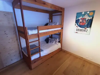 Ein Bett oder Betten in einem Zimmer der Unterkunft Agréable appartement à Grimentz, au pied des pistes