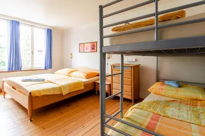 Ein Bett oder Betten in einem Zimmer der Unterkunft Happy Inn Lodge