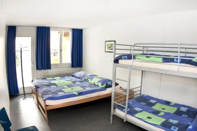 Ein Bett oder Betten in einem Zimmer der Unterkunft Happy Inn Lodge