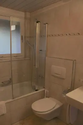 Ein Badezimmer in der Unterkunft Hotel Eigerblick