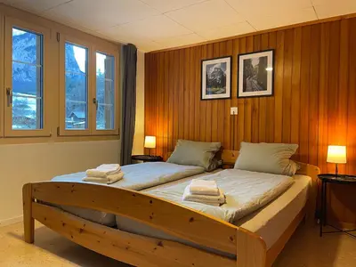 Ein Bett oder Betten in einem Zimmer der Unterkunft Apartment HasliView