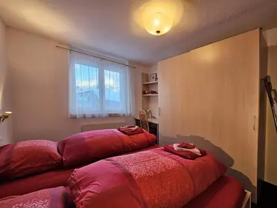 Ein Bett oder Betten in einem Zimmer der Unterkunft Felskinn 2. OG
