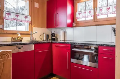 Küche/Küchenzeile in der Unterkunft Eigerhome - The Cottage mit Wellness - GRIWA RENT AG