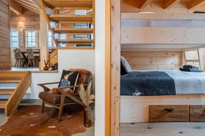 Ein Bett oder Betten in einem Zimmer der Unterkunft Chalet Marmo by HomeFlow