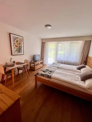 Ein Bett oder Betten in einem Zimmer der Unterkunft Appartements Elan