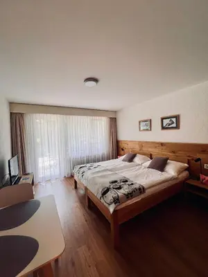 Ein Bett oder Betten in einem Zimmer der Unterkunft Appartements Elan