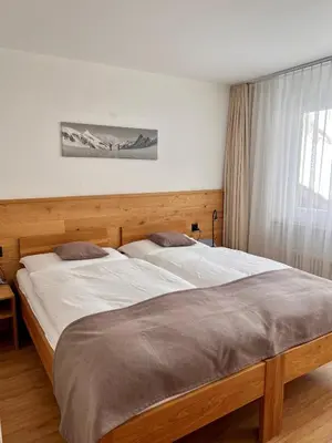 Ein Bett oder Betten in einem Zimmer der Unterkunft Appartements Elan