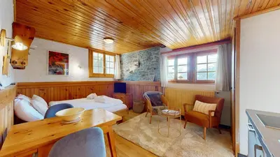 Ein Sitzbereich in der Unterkunft Charming alpine studio in the Val d'Anniviers