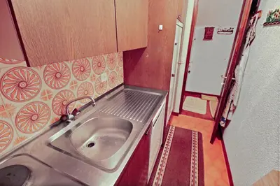 Küche/Küchenzeile in der Unterkunft Charmant appartement avec vue sur les montagnes