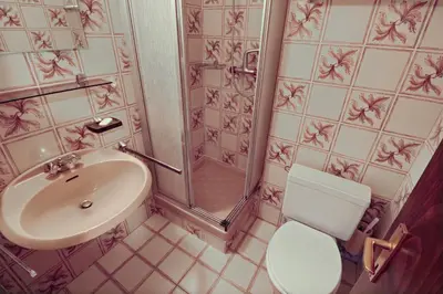 Ein Badezimmer in der Unterkunft Charmant appartement avec vue sur les montagnes