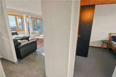 Ein Sitzbereich in der Unterkunft Logement spacieux et charmant