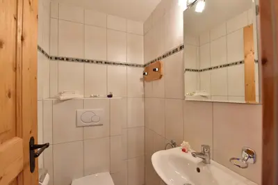 Ein Badezimmer in der Unterkunft Apartments Vieux Chalet
