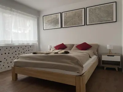 Ein Bett oder Betten in einem Zimmer der Unterkunft Sunny Alps View: Central Bliss