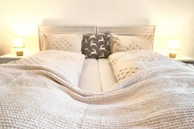 Ein Bett oder Betten in einem Zimmer der Unterkunft Double Room by Interlaken. Parking