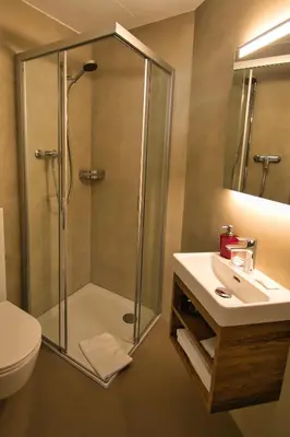 Ein Badezimmer in der Unterkunft Hotel Jungfrau