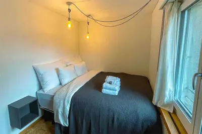 Ein Bett oder Betten in einem Zimmer der Unterkunft -The Urbanist- Mountainview Parking Garden 3BD