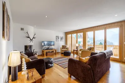 Ein Sitzbereich in der Unterkunft Chalet Aquila 5