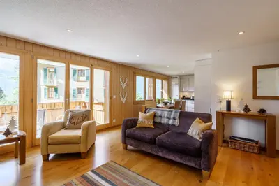 Ein Sitzbereich in der Unterkunft Chalet Aquila 5