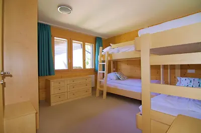 Ein Bett oder Betten in einem Zimmer der Unterkunft Chalet Bella Vista 8