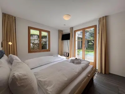 Ein Bett oder Betten in einem Zimmer der Unterkunft Chalet Bergrose 3