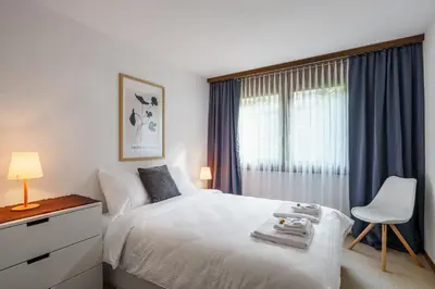 Ein Bett oder Betten in einem Zimmer der Unterkunft Chalet Krokus 6