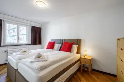 Ein Bett oder Betten in einem Zimmer der Unterkunft Post Residence 5