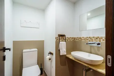 Ein Badezimmer in der Unterkunft Post Residence 5