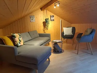 Ein Sitzbereich in der Unterkunft Family-friendly apartment with Alpine view