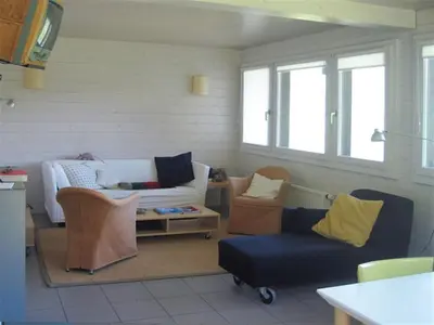 Ein Sitzbereich in der Unterkunft Chalet Mousseron