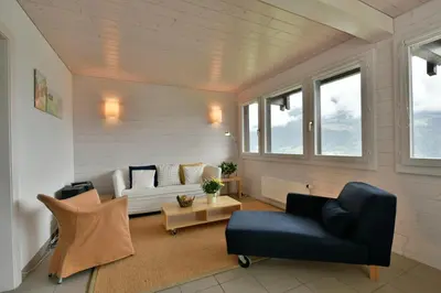 Ein Sitzbereich in der Unterkunft Chalet Mousseron