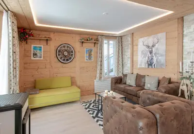 Ein Sitzbereich in der Unterkunft Chalet Lobhornblick