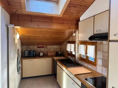 Küche/Küchenzeile in der Unterkunft APPARTEMENT DE CHARME EN ATTIQUE dans UN PETIT CHALET